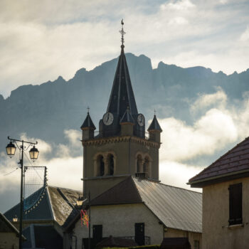 view on the bell tower of the church of gresse en vercors